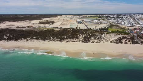 Aerial-view-over-ocean-at-Amberton-Beach-suburb-in-Perth