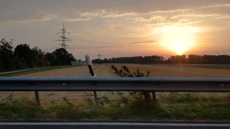 driving on autobahn in germany during sunset