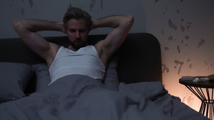 Man in the bedroom at night