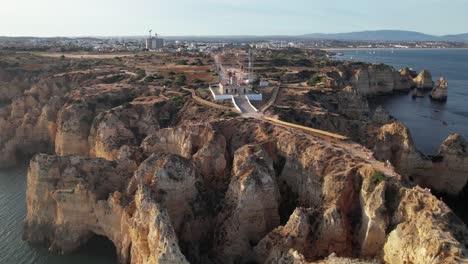 Aerial-view-of-Ponta-da-Piedade-rock-formations-in-Lagos,-Portugal