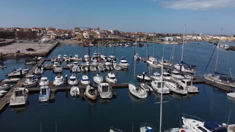 sailboats and yachts in marina boat harbour in peniche, portugal - aerial