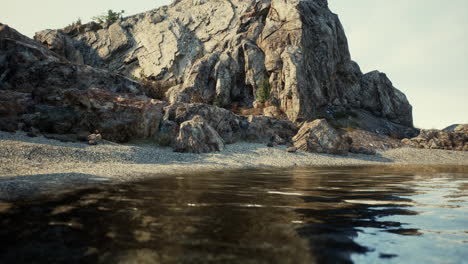 majestic rocky mountain overlooking a serene water body