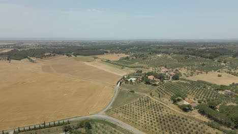 aerial images of tuscany in italy cultivated fields summer, beautiful italian landscape