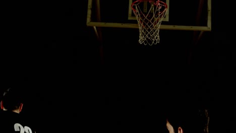 competitors playing basketball in the court 4k