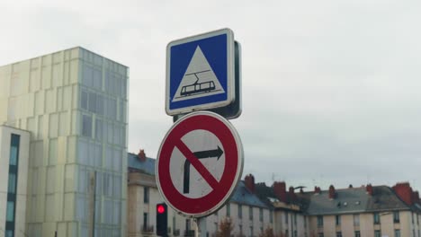 Warning signage indicating trams in operation and mandatory no right turn