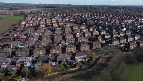 typical suburban village residential neighbourhood liverpool property rooftops aerial view push in right