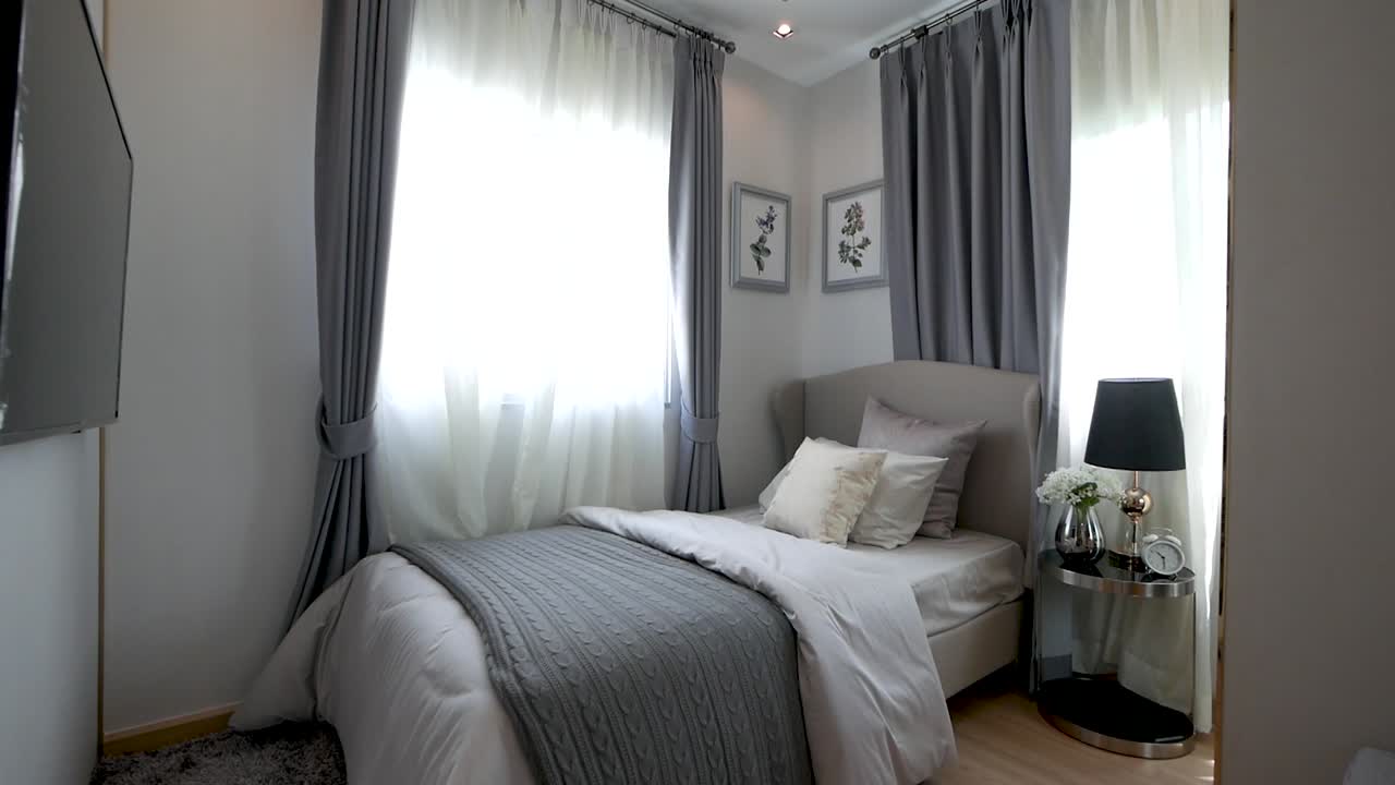 decoración de dormitorio elegante y moderna con buena luz natural