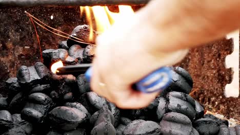 starting up a fire on the grill