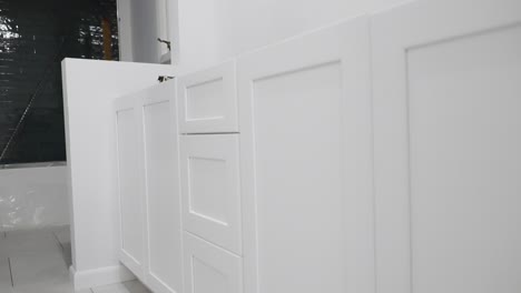Modern-style-cabinets-freshly-installed-during-a-bathroom-redesign-project