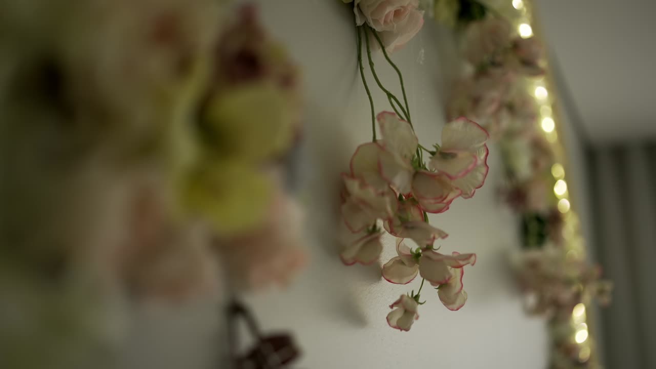 Delicate flowers with gentle lights create dreamy decor