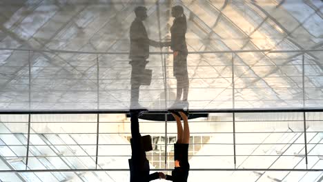 the business man and a woman walking in the office hall