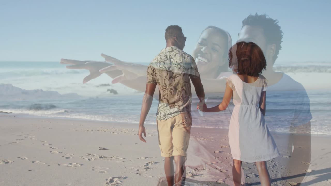 Crossfading overlay revealing couple holding hands walking ocean shore leaving prints for travel ad