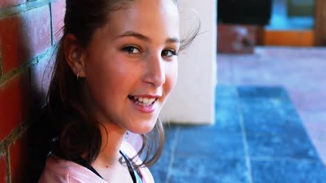Portrait-of-smiling-schoolgirl