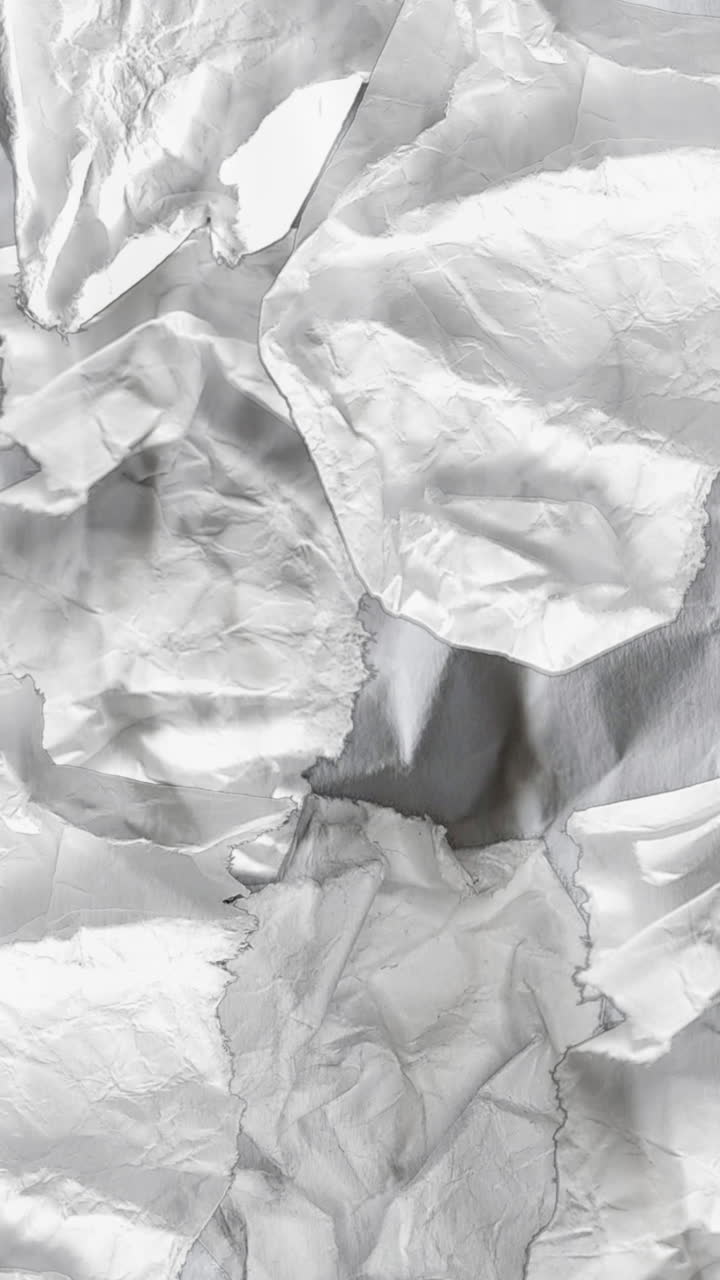 Bucle de fondo con textura abstracta de papel blanco arrugado