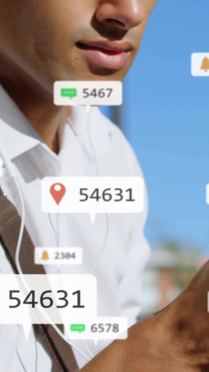 Initial pin bubble popping, man looking down and tapping device while alerts clustering to check