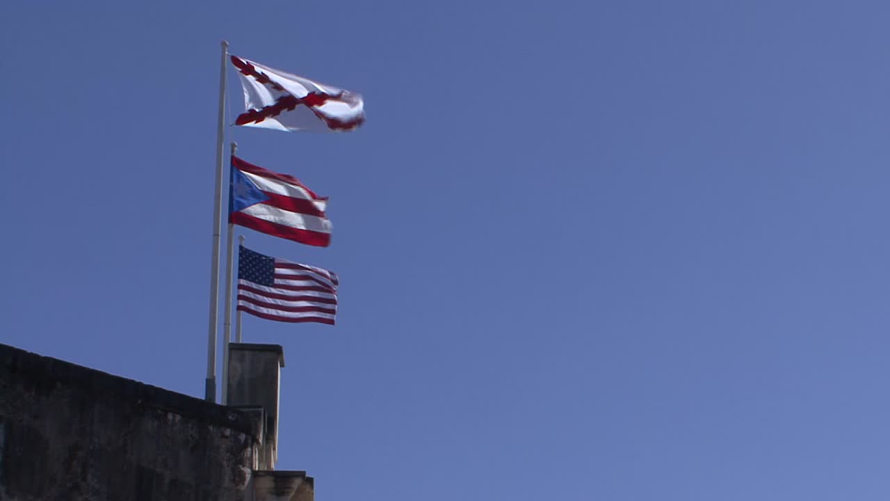 Flags of Puerto Rico and USA in the fortress of San Felipe del Morro in San Juan