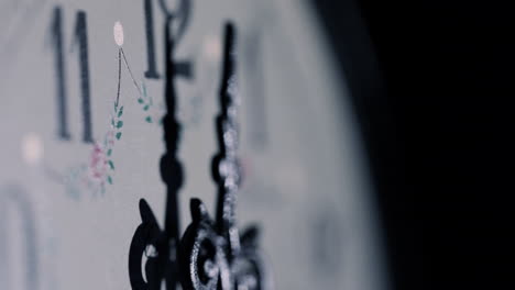 close-up-macro-of-an-old-clock-needle-in-studio-lighting-with-a-turning-movement