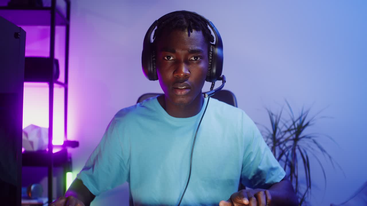 Man with headset gaming