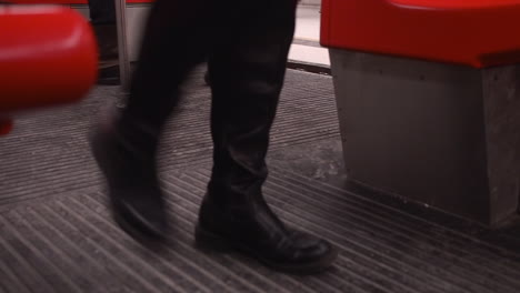 low angle: metro transit train door opens, people enter and exit train