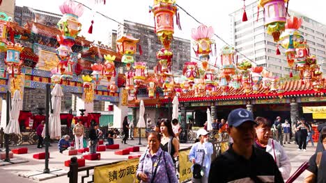 colorful lanterns and bustling crowds in hong kong