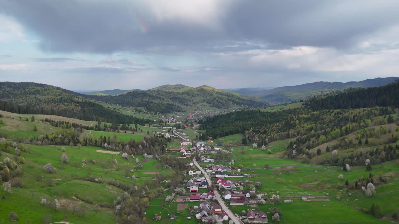 Drone video of Poiana Micului village and the hills around