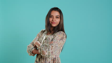 Portrait-of-optimistic-woman-with-positive-facial-expression-smiling