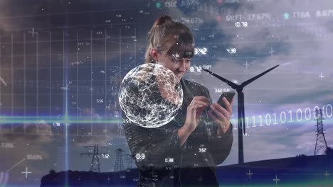 animation of globe, data processing over caucasian businesswoman using phone against wind turbine