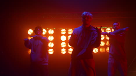 dancers performing hiphop dance on talent show. confident guys dancing freestyle