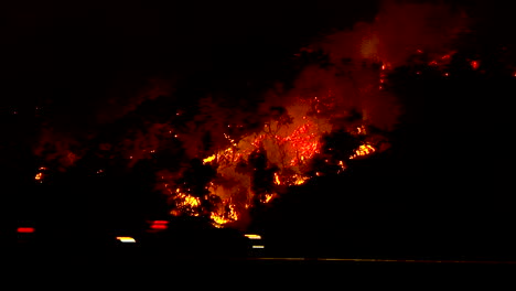 the thomas fire burns in the hills above the 101 freeway near ventura and santa barbara california 1