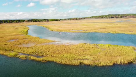 Aerial-over-kayakers-rowing-through-vast-bogs-along-the-Nonesuch-River-near-Portland-Maine-New-England