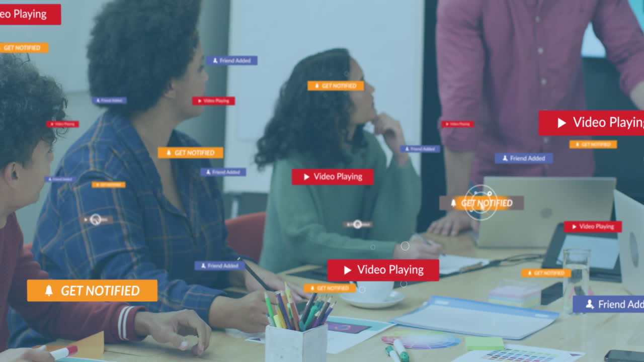 Animation of social media icons and data processing over diverse business people in office