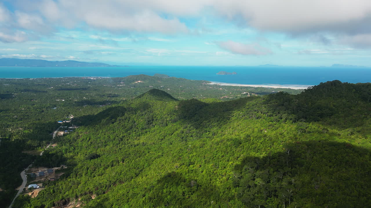 Ocean View From Lush Green Hills On The Coastline Of Koh Phangan In Thailand