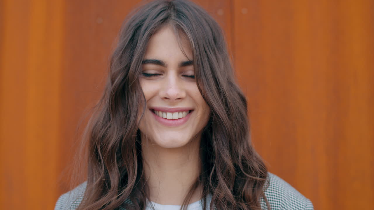 A Young Woman's Expressions: From Mask to Smile