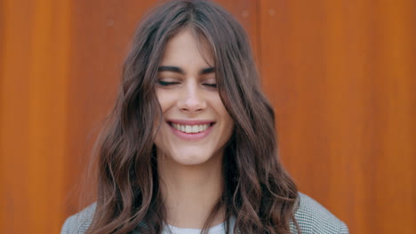 a young woman's expressions: from mask to smile