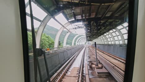 view from the train driver's seat through the front window in hong kong