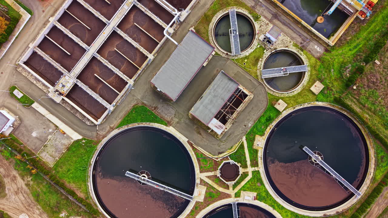 Electrifying views of a wastewater treatment plant showcasing the intricate processes of water purification