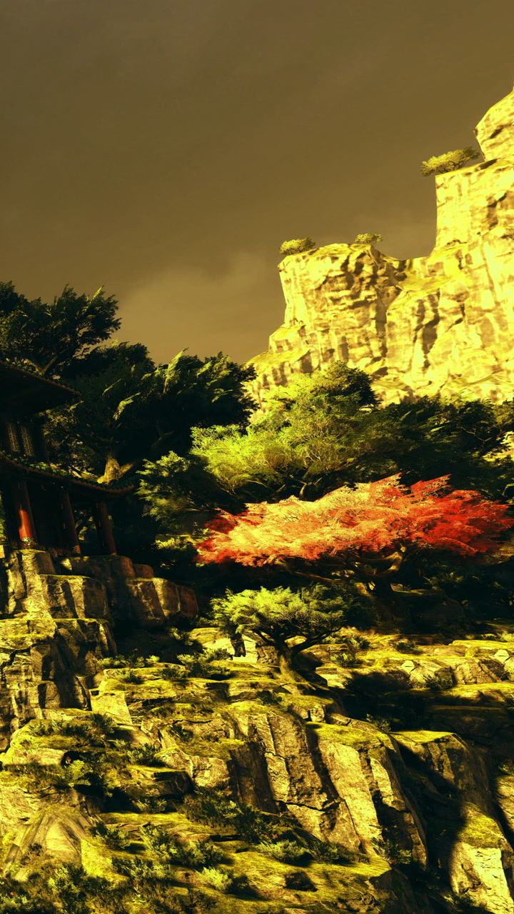 Vivid autumn colors dance among ancient rocks and lush greenery at sunset