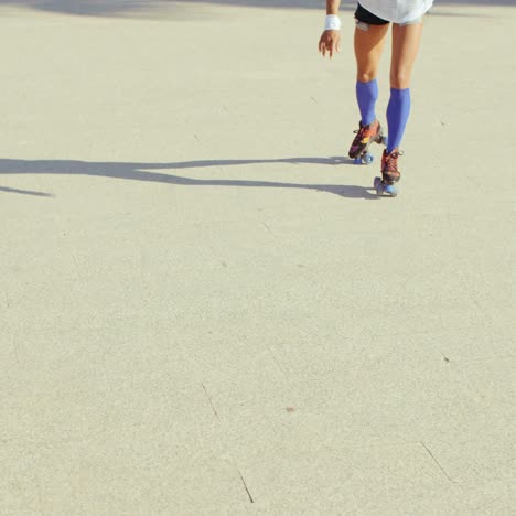 Close-Up-of-Girl-Riding-Roller-Skates