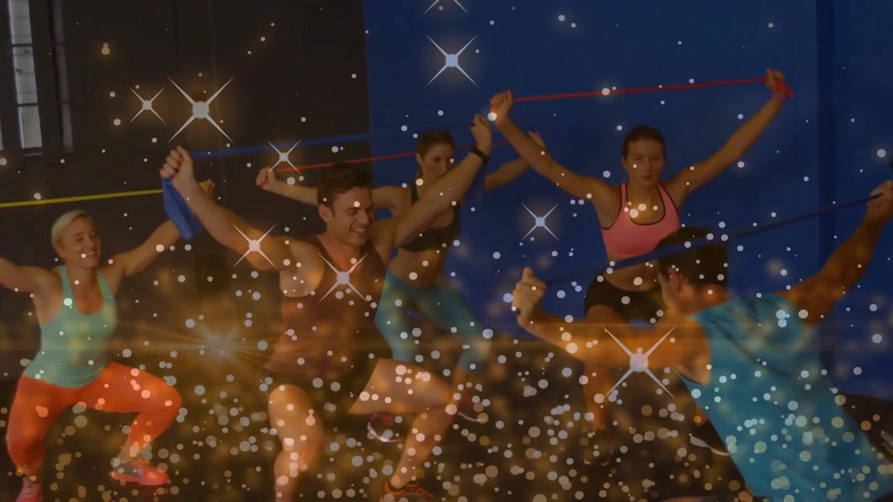 Trainer leading, group syncing squats and arm raises with bands for fitness, sparkle overlay rising