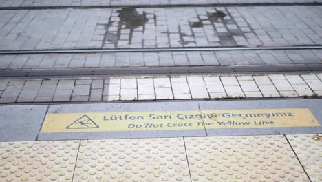 do not cross the yellow line - tram tracks