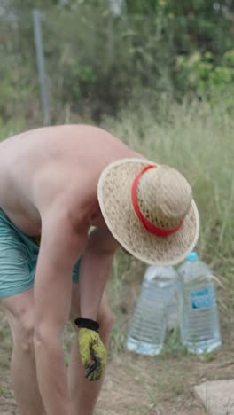 man preparing paella outdoors