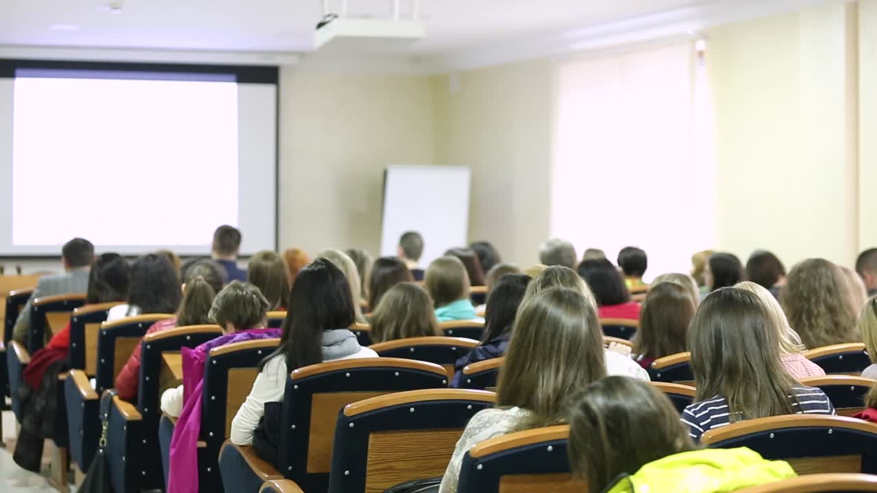 People Visiting Business Conference. Conference hall or seminar room with people, Business meeting concept