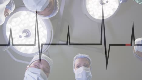 Animation-of-cardiograph-over-diverse-surgeons-operating-on-patient-at-hospital