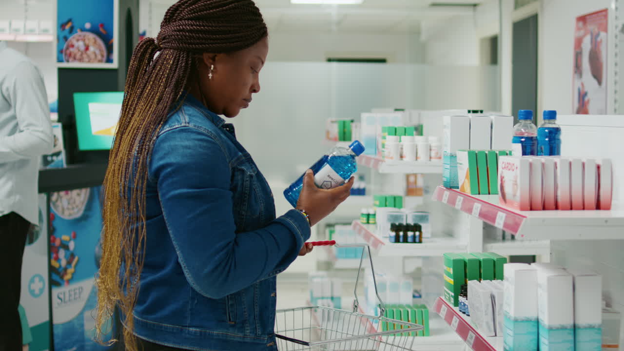 Customers shopping for medicine at a pharmacy