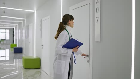 doctor walking through hospital corridor