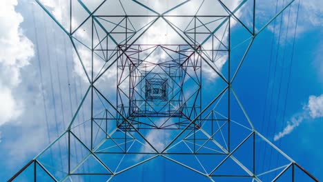 4k timelapse of high voltage post.high-voltage tower sky background