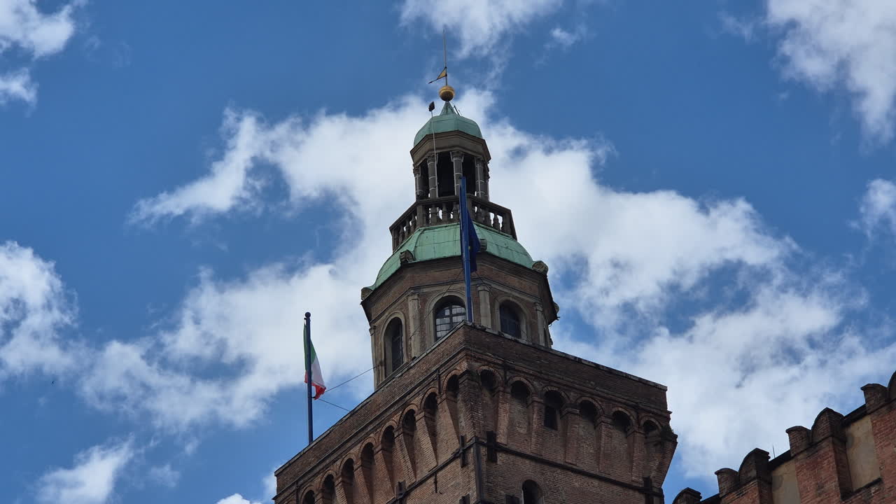 The bell tower of Palazzo d'Accursio or Palazzo Comunale in Bologna, Emilia Romagna, Italy