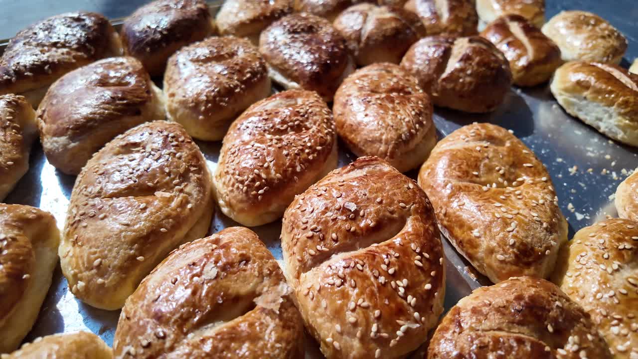 Freshly baked pastries with sesame seeds