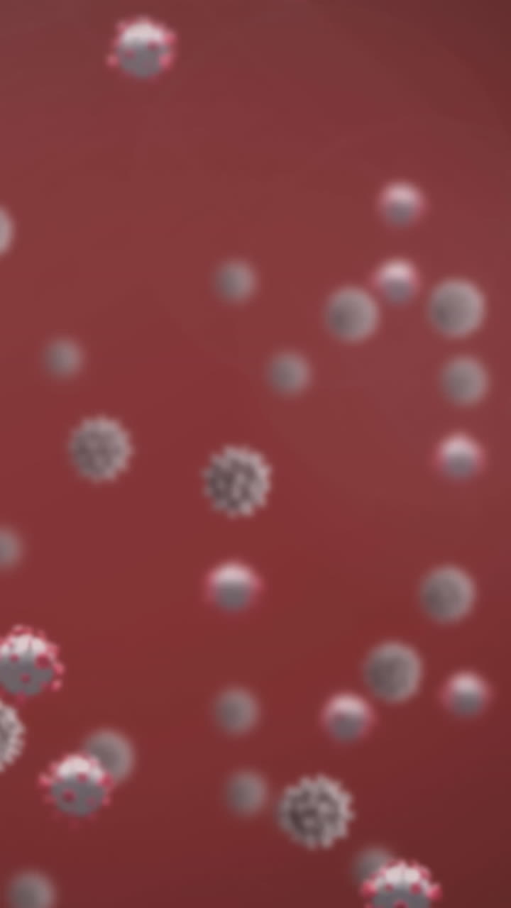 Animazione di cellule Covid-19 che fluttuano su sfondo rosso.