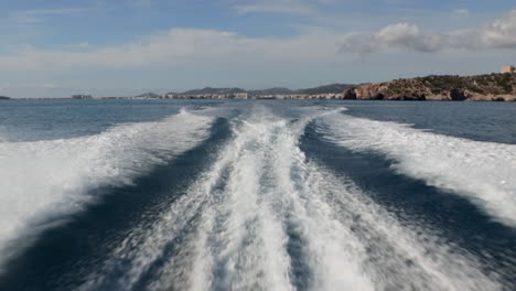 slowmotion of the wake ship of a van dutch design boat in ibiza, spain